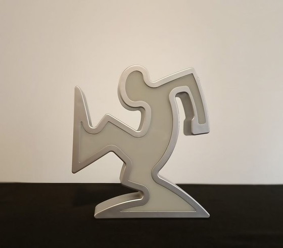 Image 1 of Keith Haring La Linea Lamp Osvaldo Cavandoli argenté dans son emballage d'origine