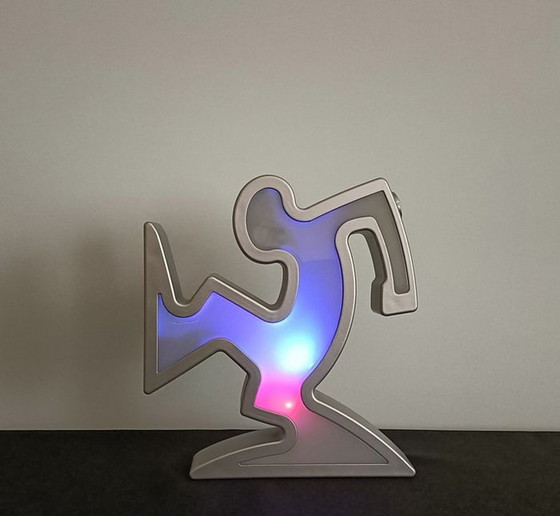 Image 1 of Keith Haring La Linea Lamp Osvaldo Cavandoli argenté dans son emballage d'origine