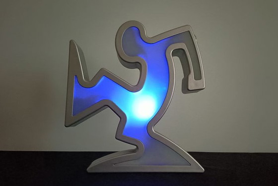 Image 1 of Keith Haring La Linea Lamp Osvaldo Cavandoli argenté dans son emballage d'origine