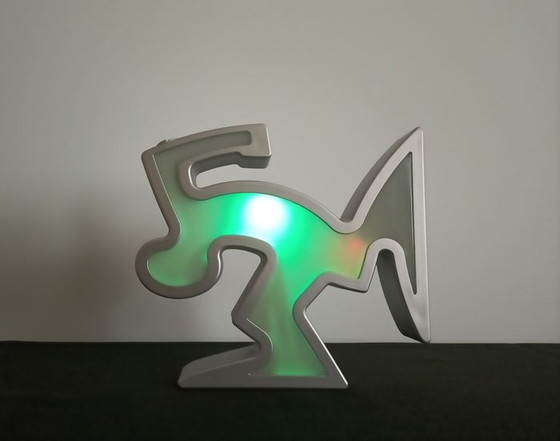 Image 1 of Keith Haring La Linea Lamp Osvaldo Cavandoli argenté dans son emballage d'origine