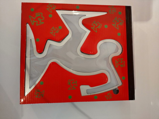 Image 1 of Keith Haring La Linea Lamp Osvaldo Cavandoli argenté dans son emballage d'origine