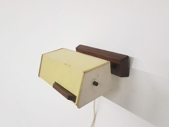 Image 1 of Niek Hiemstra voor evolux yellow metal and wood wall light