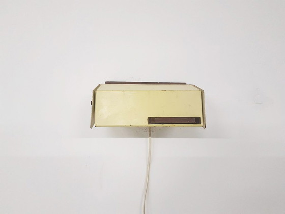 Image 1 of Niek Hiemstra voor evolux yellow metal and wood wall light