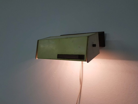 Image 1 of Niek Hiemstra voor evolux yellow metal and wood wall light