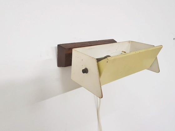 Image 1 of Niek Hiemstra voor evolux yellow metal and wood wall light