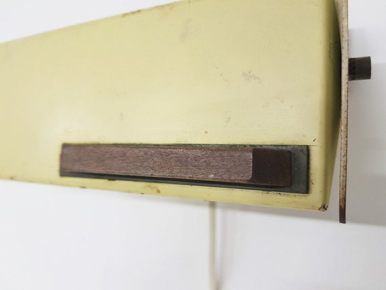 Image 1 of Niek Hiemstra voor evolux yellow metal and wood wall light