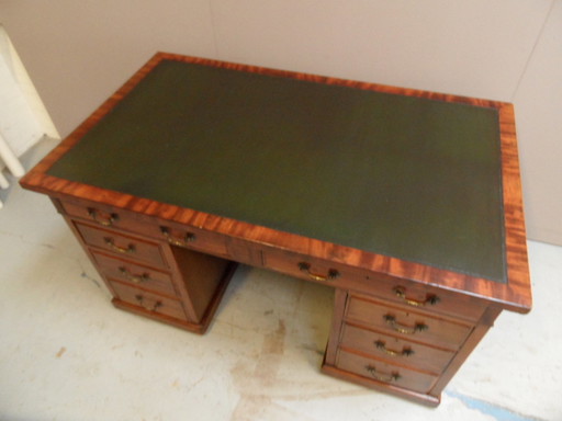 Antique mahogany desk with leather top