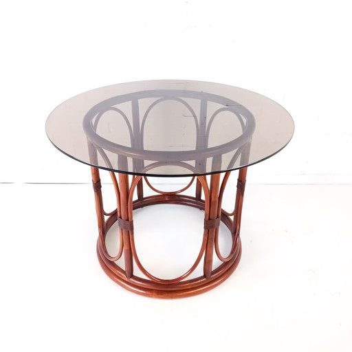 Vintage manou with smoked glass dining table