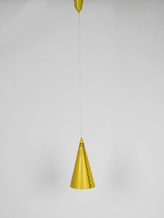 Image 1 of Rare Mid Century Modern cone shaped pendant lamp made of sheet steel in yellow