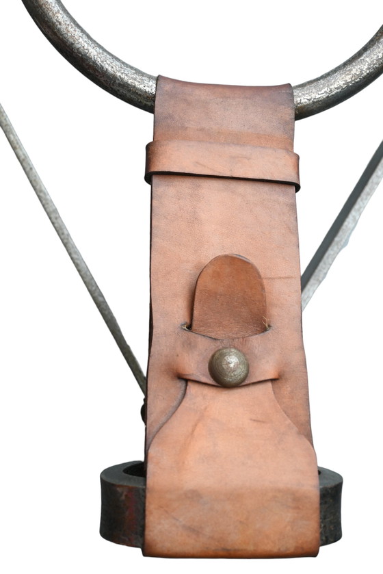 Image 1 of Jean Pierre Ryckaert, une table basse brutaliste en fer et cuir des années 50