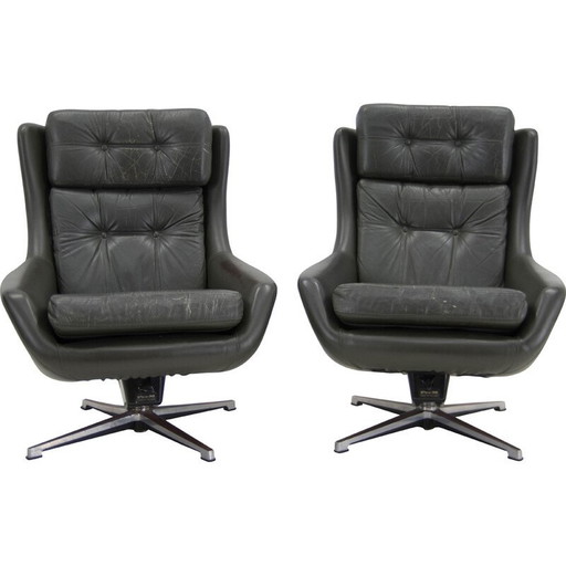 Pair of mid century swivel rocking leather armchairs, Finland 1970s