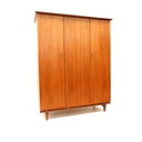 Armoire vintage avec partie suspendue et posée, fabriquée dans les années 1960