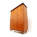 Armoire vintage avec partie suspendue et posée, fabriquée dans les années 1960