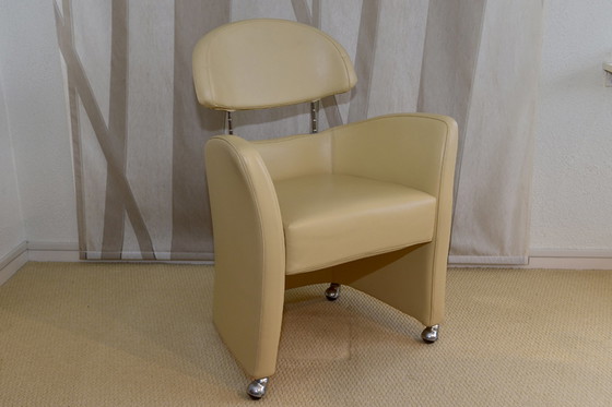 Image 1 of 4 Frighetto leather dining room chairs on wheels and adjustable backrest