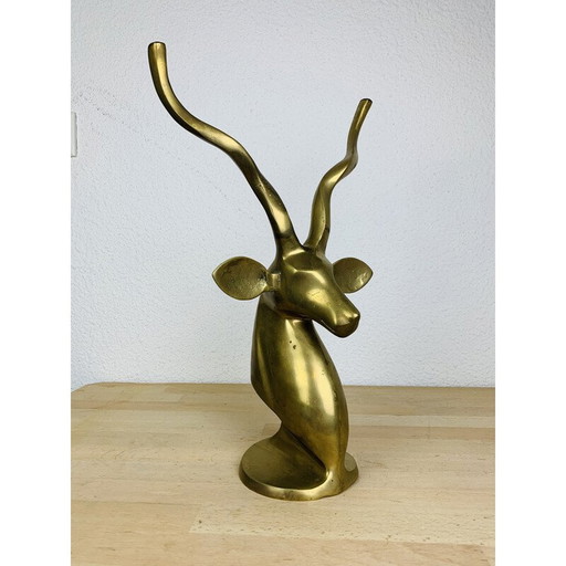 Vintage antelope head in brass