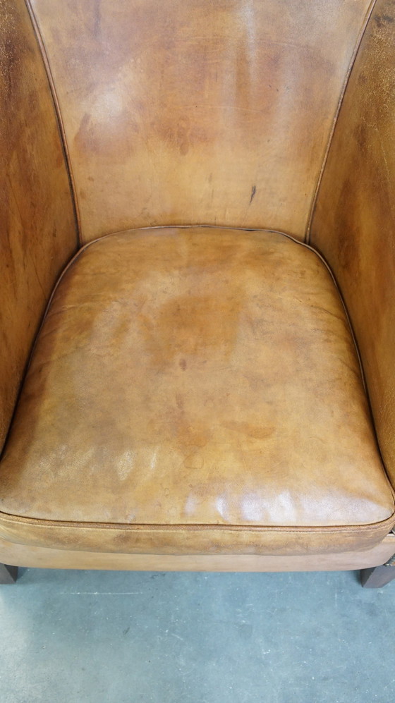 Image 1 of Poltrona Club in pelle di pecora rifinita con chiodi decorativi