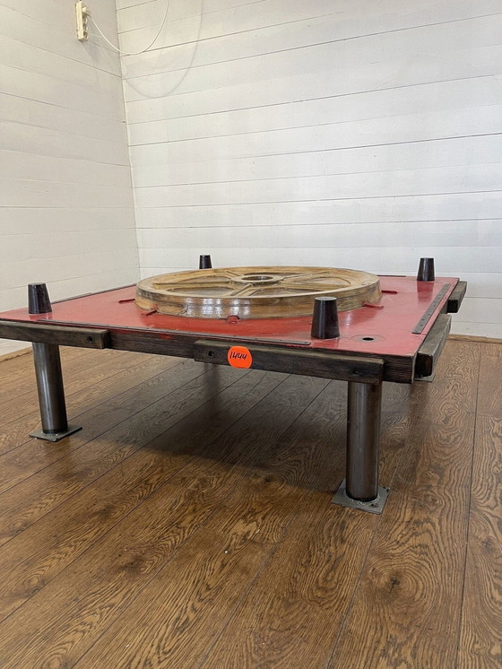 Image 1 of Unique industrial table made from a wooden mold with negative train wheel