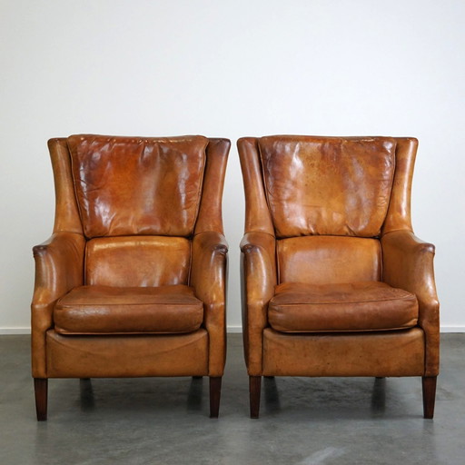 Set of two sheep leather armchairs