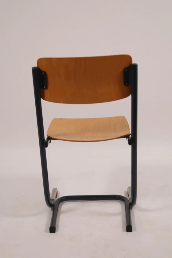 Image 1 of Chaise d'école vintage Prehiskaaf métal et bois, empilable 1970