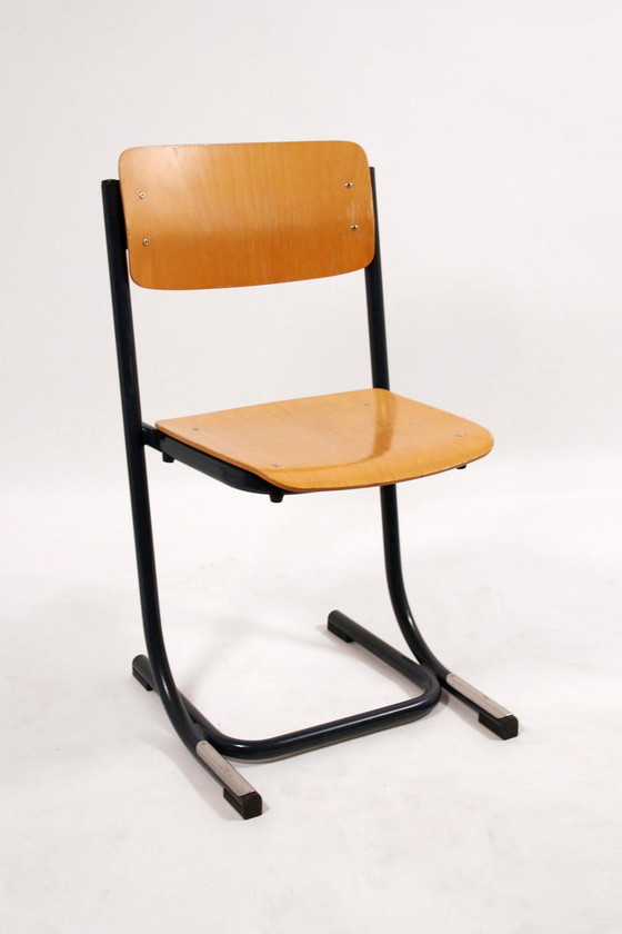 Image 1 of Chaise d'école vintage Prehiskaaf métal et bois, empilable 1970