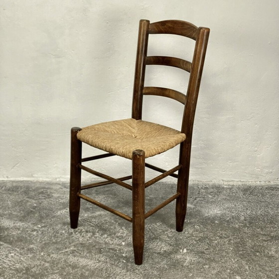 Image 1 of Vintage Bauche N°19 chair in solid wood and straw by Charlotte Perriand