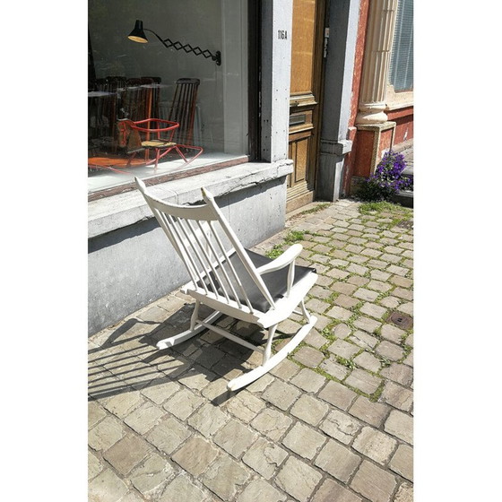 Image 1 of Vintage rocking chair in wood and dark blue imitation leather