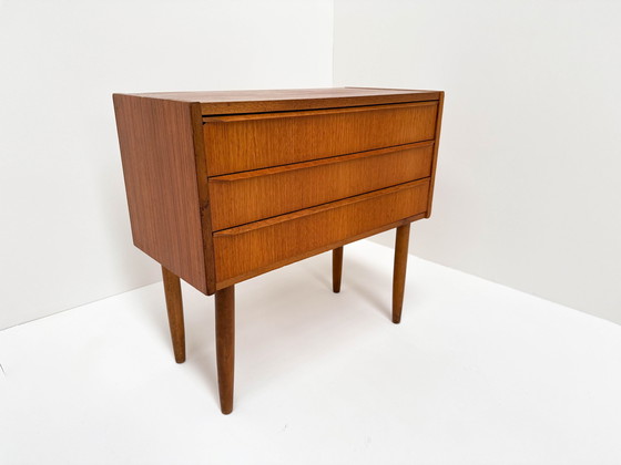 Image 1 of Mid-Century Teak Veneer Chest Of Drawers – Scandinavian Minimalist Design