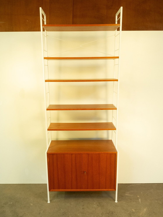 Image 1 of String shelf with cupboard module, teak, 1960s