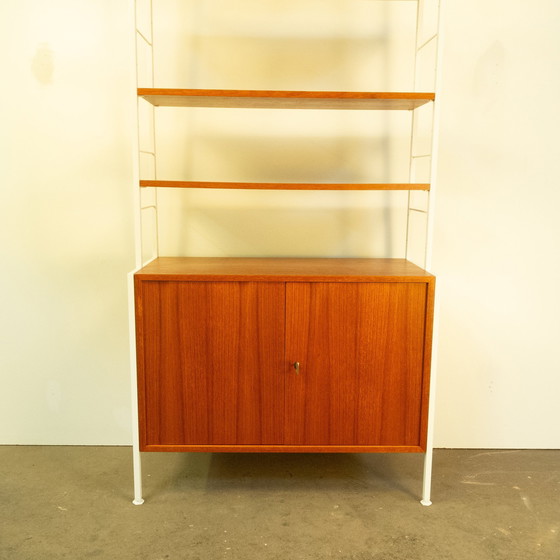 Image 1 of String shelf with cupboard module, teak, 1960s