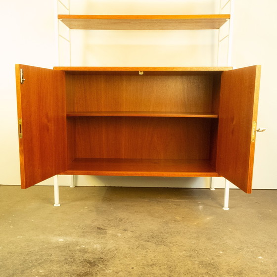 Image 1 of String shelf with cupboard module, teak, 1960s