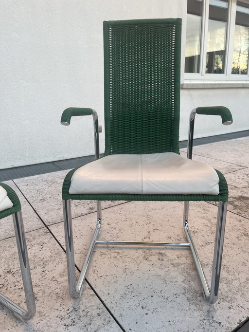 2 pcs Tecta Cantilever Chairs In Fresh Green With Armrests And White Leather Cushions On The Seat, Design By Axel Bruchhäuser