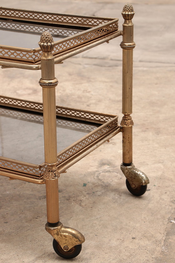 Image 1 of Chariot de trois tables avec verre fumé fabriqué dans les années 50 en France.