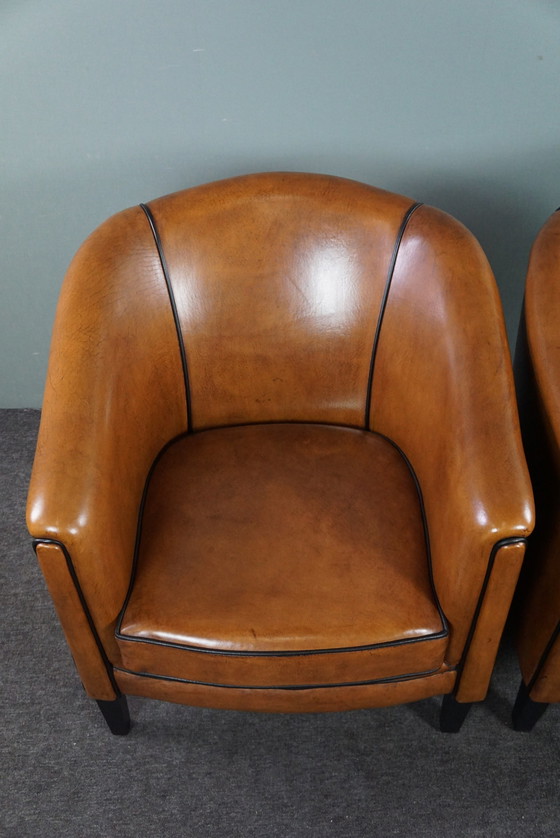 Image 1 of New set of two sheep leather armchairs with black piping