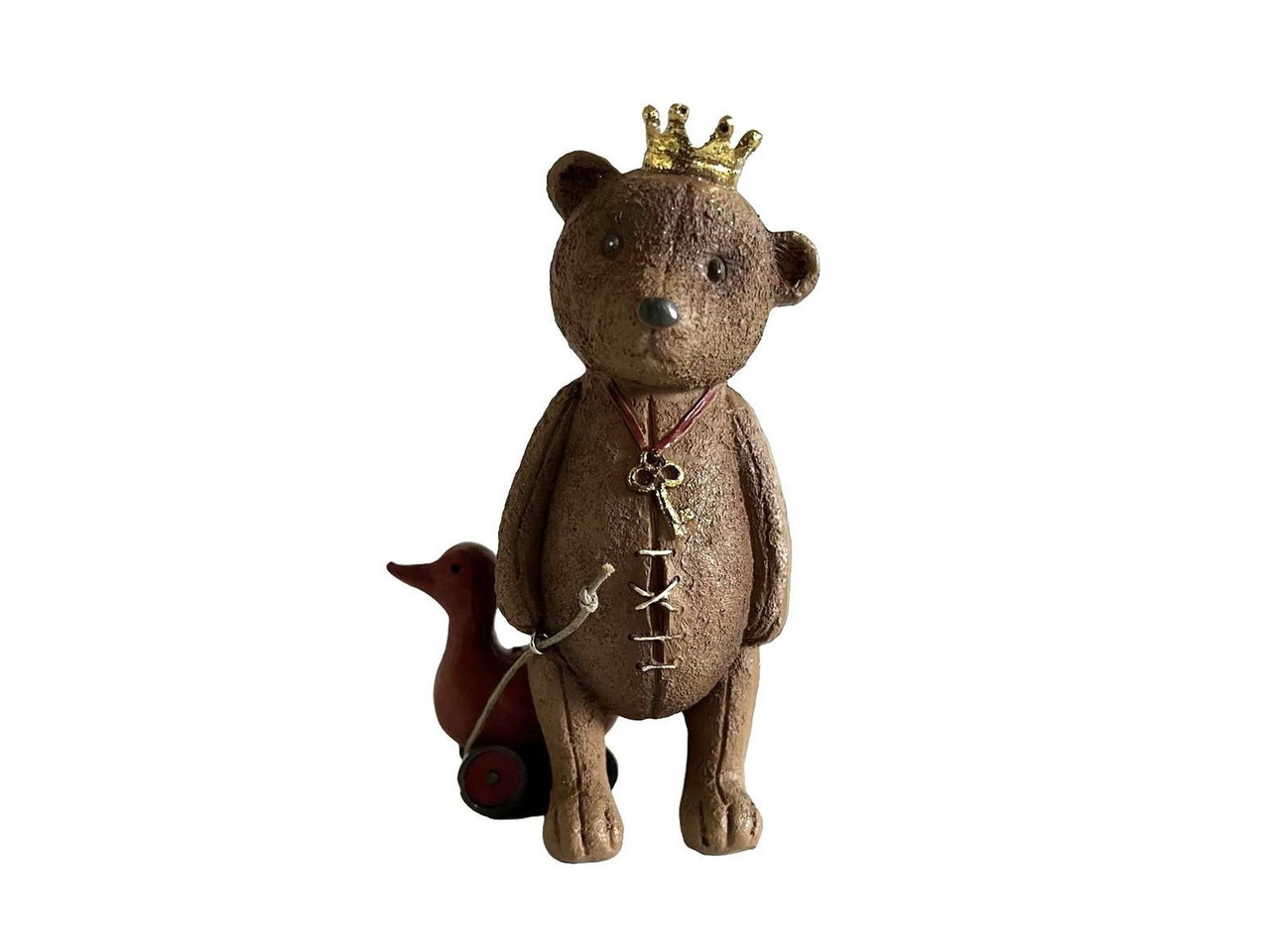 Orso con anatra giocattolo