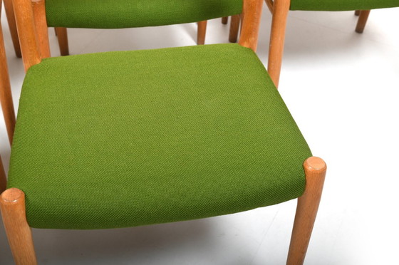 Image 1 of Set of 8 dining chairs in solid oak by Niels O. Møller. Model no.75. Seats in green Kvadrat wool fabric. Produced by J.L. Mølle