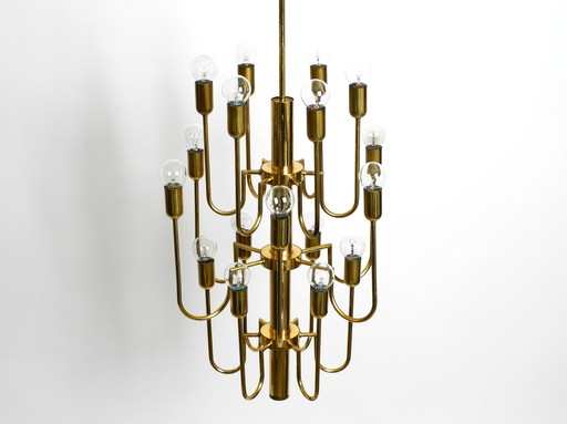 Beautiful Three Staged 18 Arm Mid Century Brass Chandelier With A Long Brass Rod
