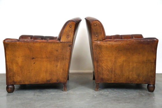 Image 1 of Set of 2 old sheep leather armchairs