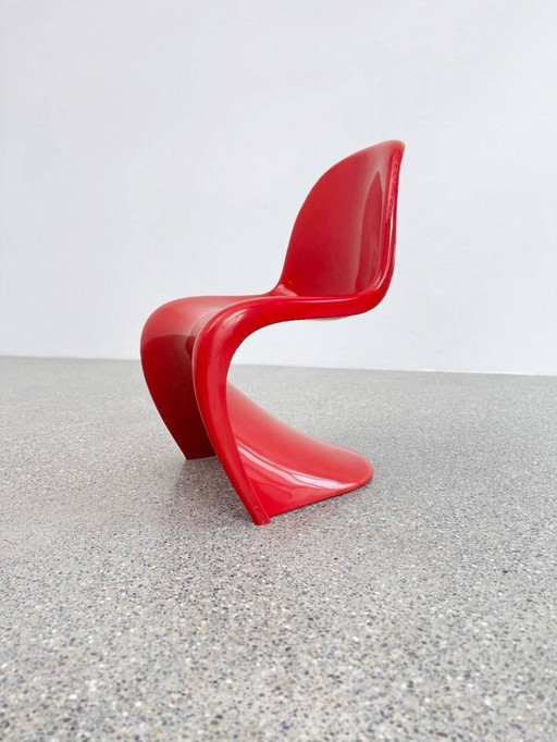 Panton Chair in red by Verner Panton for Herman Miller / Fehlbaum Produktion