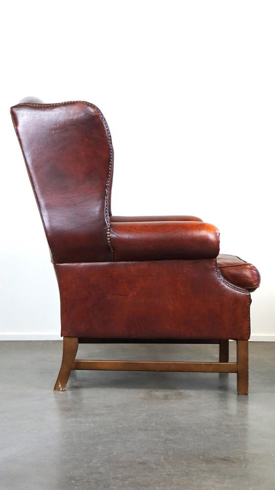 Image 1 of Grand fauteuil à oreilles en cuir de mouton