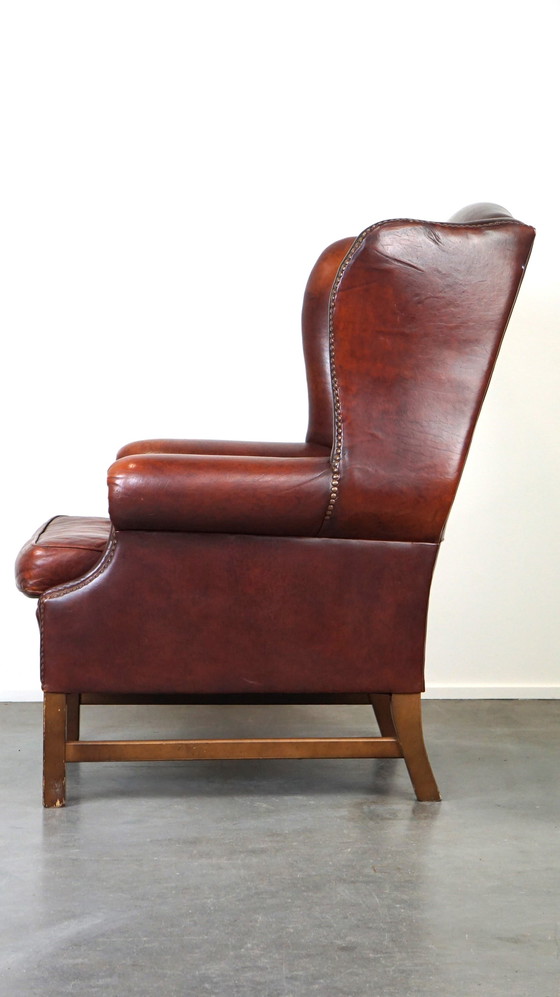 Image 1 of Grand fauteuil à oreilles en cuir de mouton