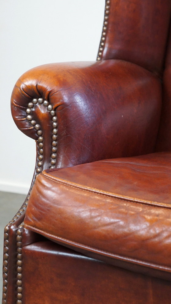 Image 1 of Grand fauteuil à oreilles en cuir de mouton