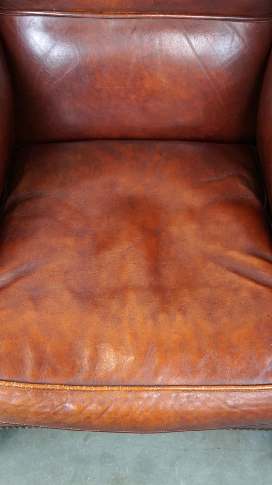 Image 1 of Grand fauteuil à oreilles en cuir de mouton