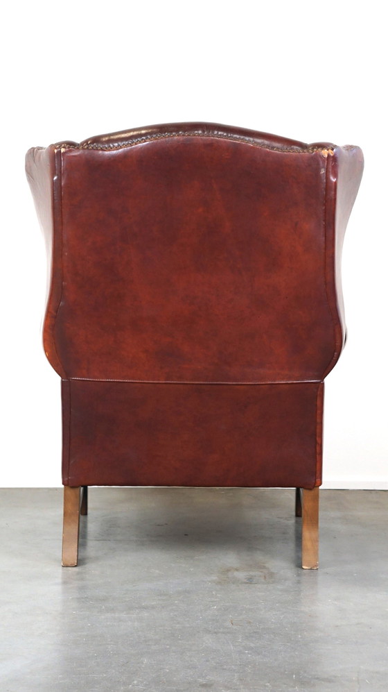 Image 1 of Grand fauteuil à oreilles en cuir de mouton