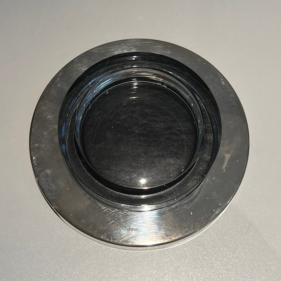 Image 1 of Vintage glass pocket tray resting on a chrome base
