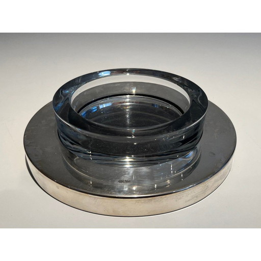 Vintage glass pocket tray resting on a chrome base