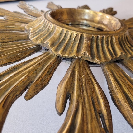 Image 1 of Vintage convex mirror with a carved and gilded wooden frame in the shape of a sun, France 1930