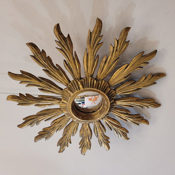 Image 1 of Vintage convex mirror with a carved and gilded wooden frame in the shape of a sun, France 1930