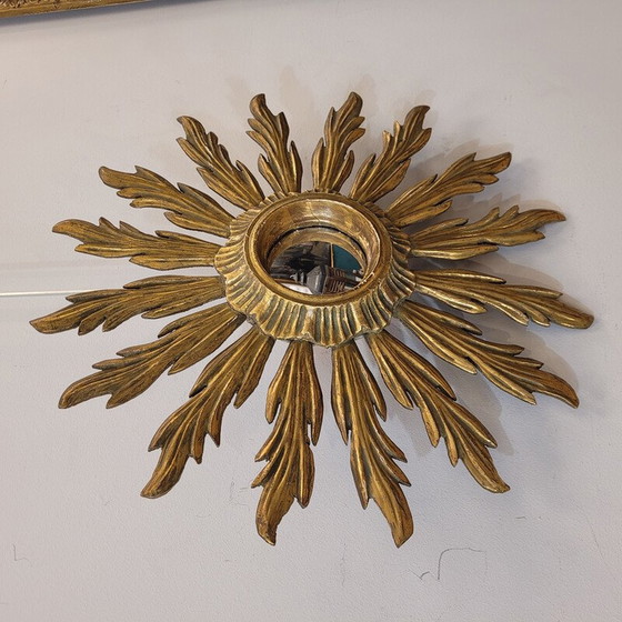 Image 1 of Vintage convex mirror with a carved and gilded wooden frame in the shape of a sun, France 1930
