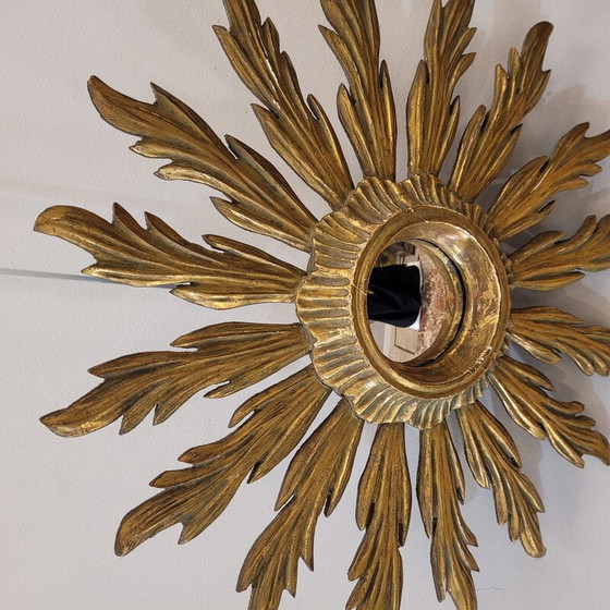 Image 1 of Vintage convex mirror with a carved and gilded wooden frame in the shape of a sun, France 1930
