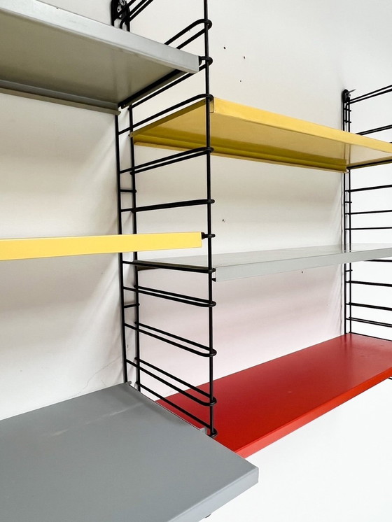 Image 1 of Nine-Piece Yellow/Red Tomado Wall Rack From A. Dekker, 1950'S